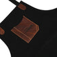 Tablier de toile cirée noire et cuir marron noyer